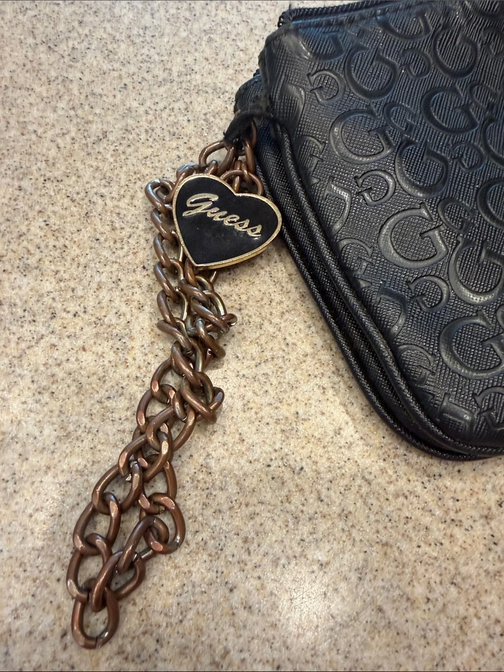 Guess Black Embossed Signature Wristlet with Chain and Heart Charm